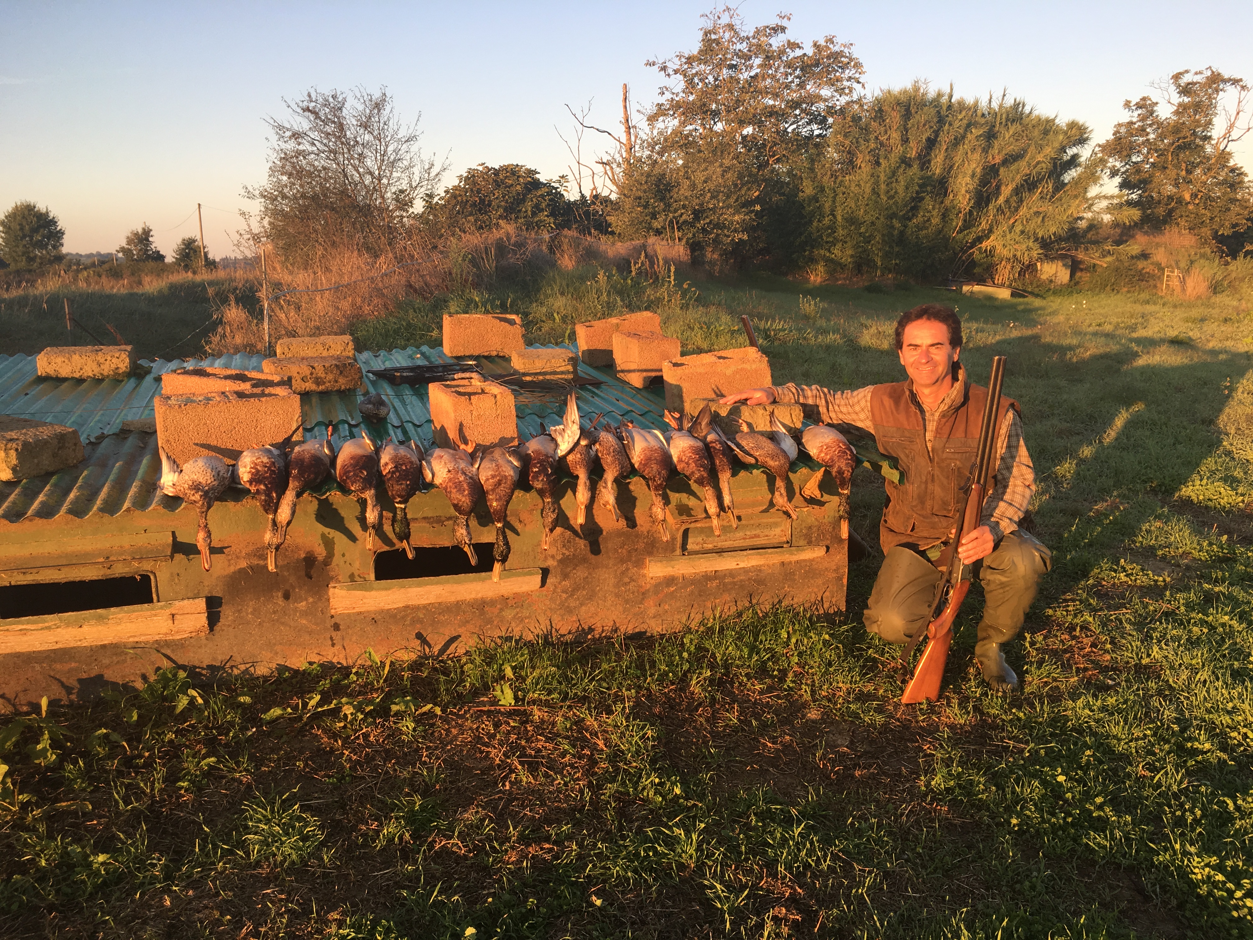 waterfowl hunting at lake in tuscany